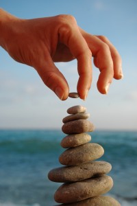 Stone tower on a pebble beach